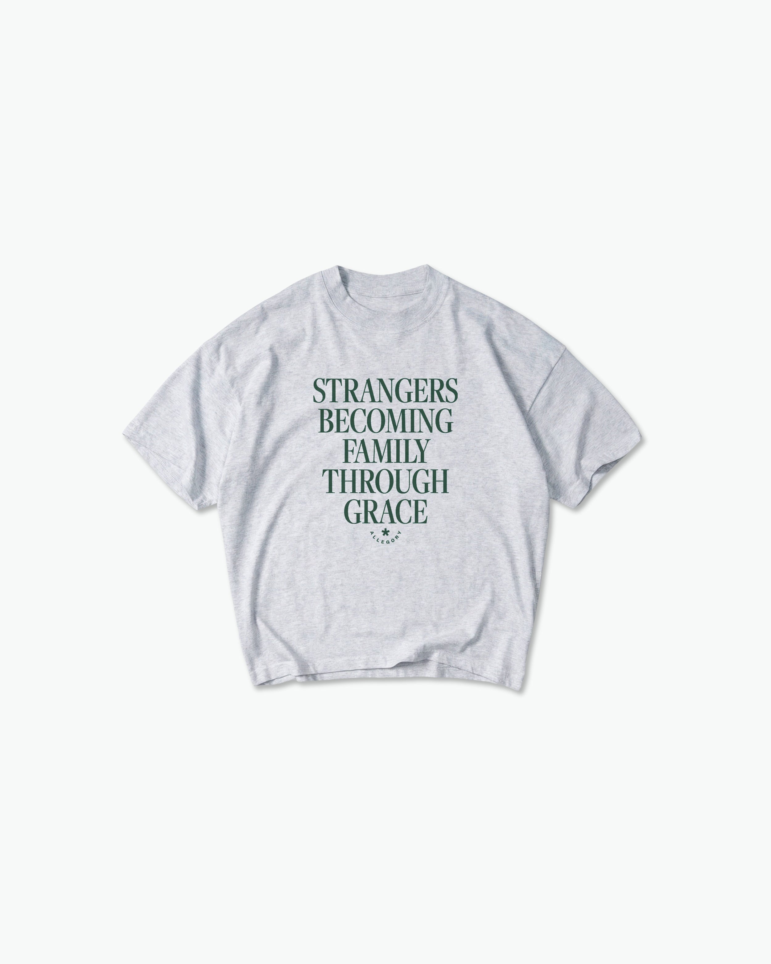 Strangers Becoming Family Through Grace Tee